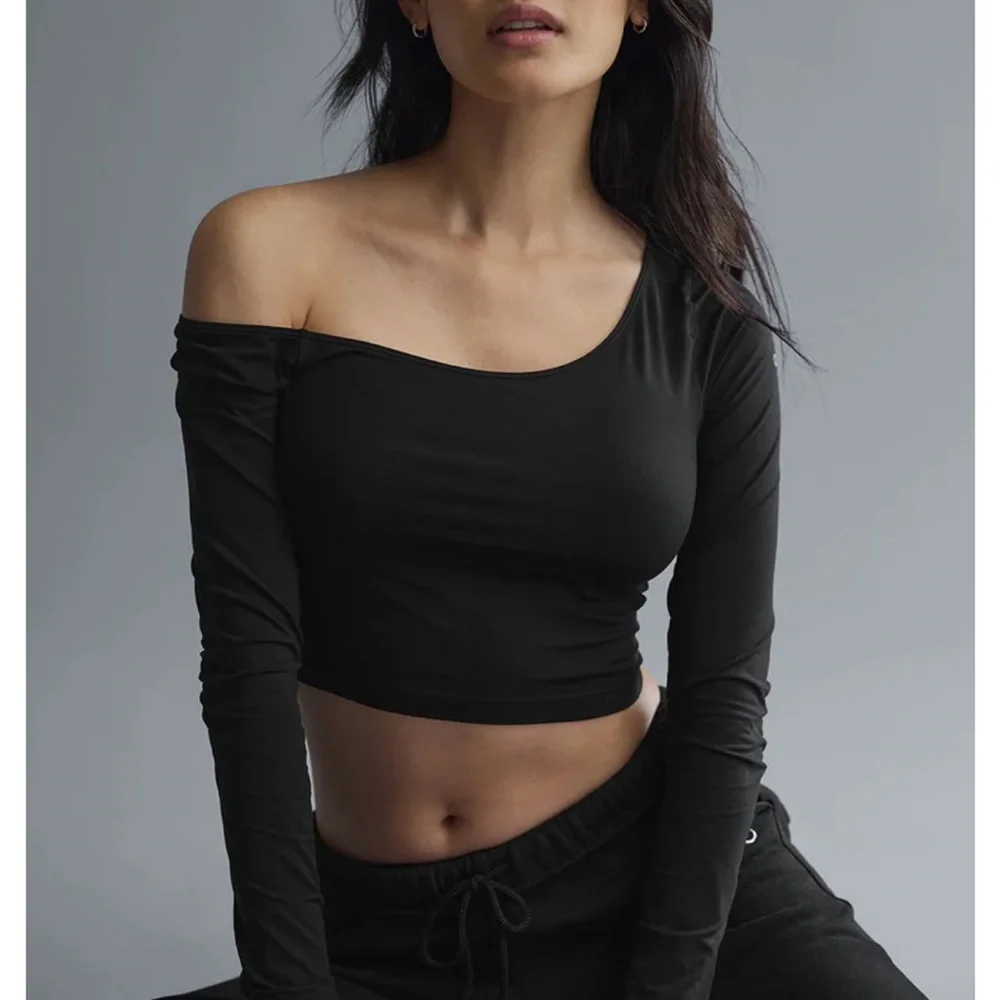 ALO Black Asymmetric Sheer Glow Long Sleeve Crop Top NWOT - Picture 2 of 6